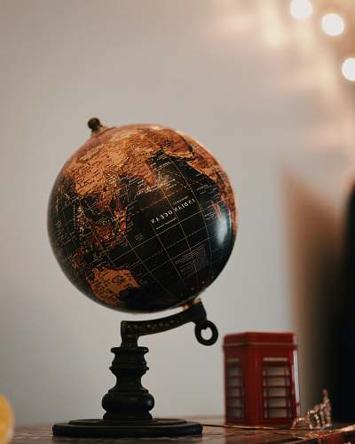 outer space globe on black surface lamp